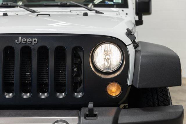 used 2016 Jeep Wrangler Unlimited car, priced at $21,450