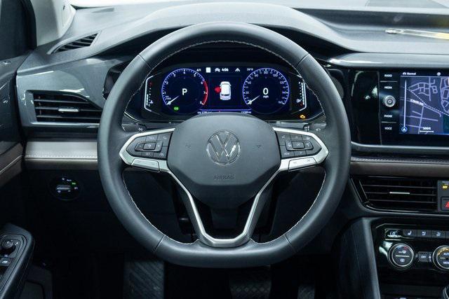 used 2023 Volkswagen Taos car, priced at $25,500