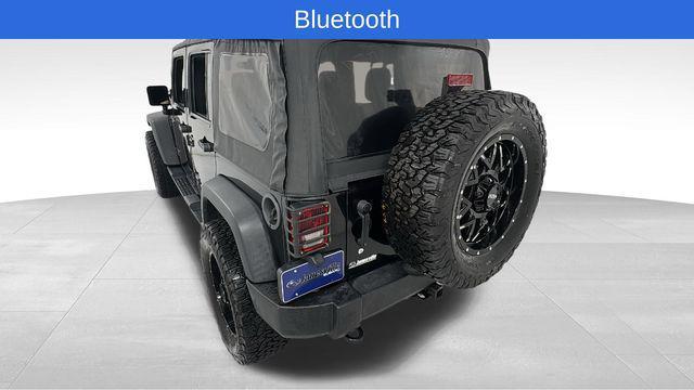 used 2015 Jeep Wrangler Unlimited car, priced at $20,780