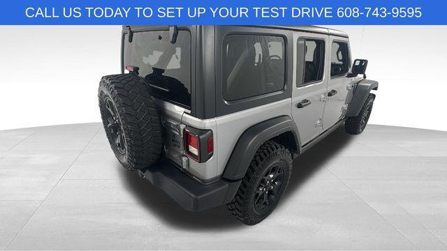used 2021 Jeep Wrangler Unlimited car, priced at $27,578