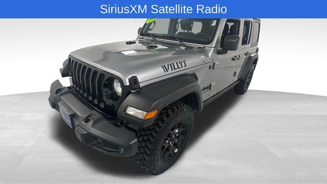 used 2021 Jeep Wrangler Unlimited car, priced at $27,578