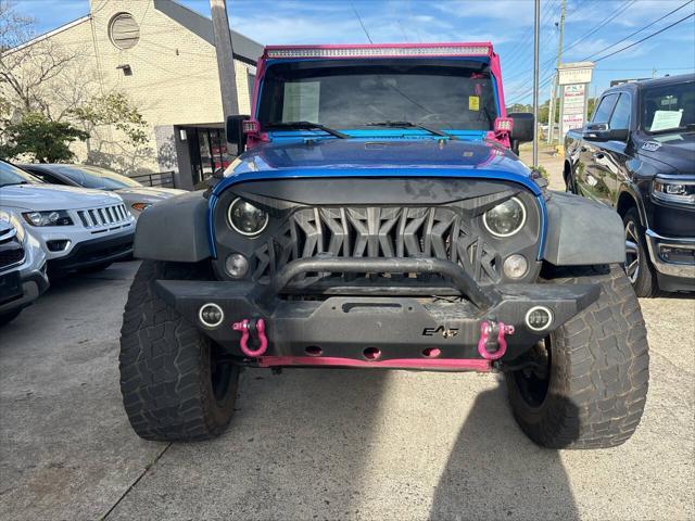 used 2016 Jeep Wrangler Unlimited car, priced at $14,995