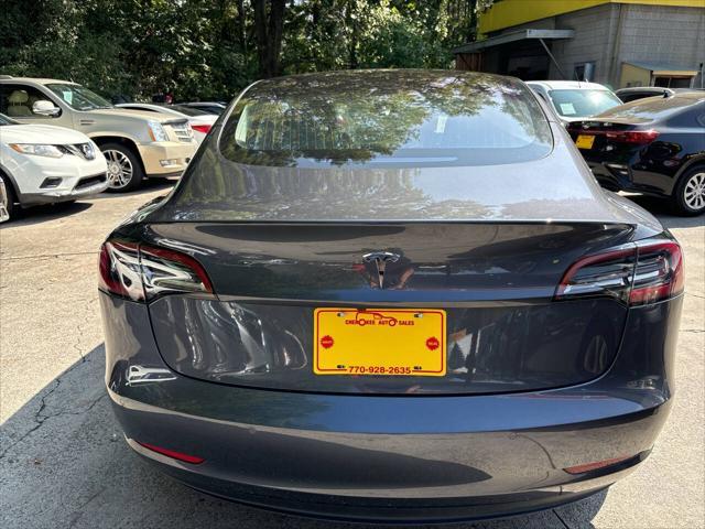 used 2018 Tesla Model 3 car, priced at $22,995