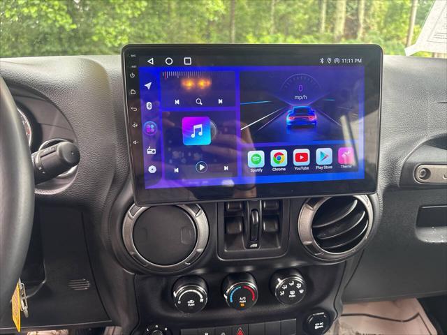 used 2015 Jeep Wrangler Unlimited car, priced at $15,995