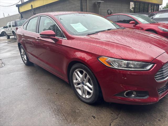 used 2016 Ford Fusion car, priced at $9,995