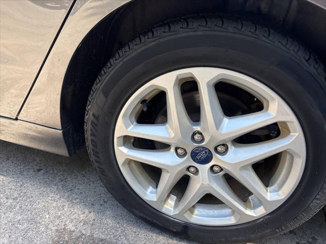 used 2016 Ford Fusion car, priced at $7,995
