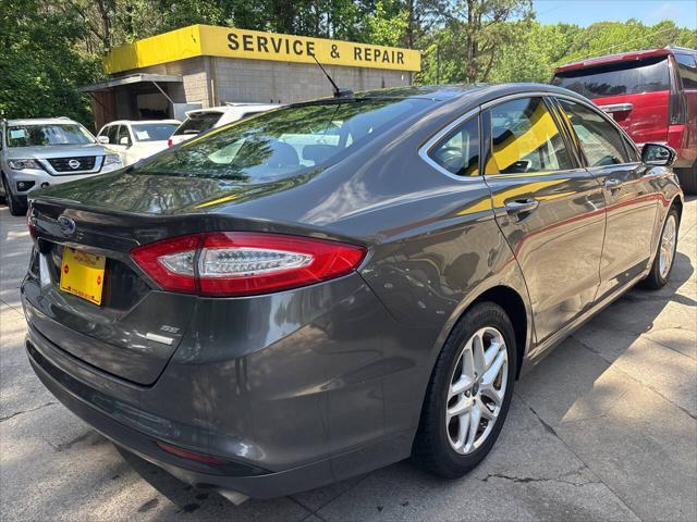 used 2016 Ford Fusion car, priced at $7,995