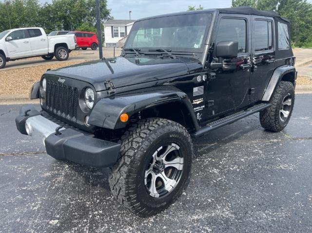 used 2014 Jeep Wrangler Unlimited car, priced at $12,980