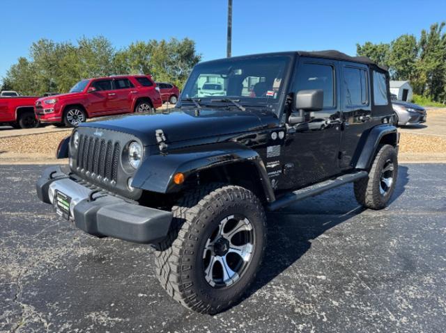 used 2014 Jeep Wrangler Unlimited car, priced at $15,980