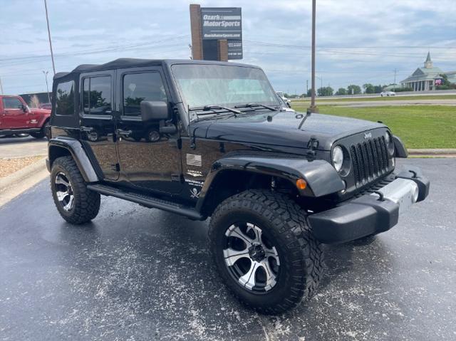 used 2014 Jeep Wrangler Unlimited car, priced at $12,980