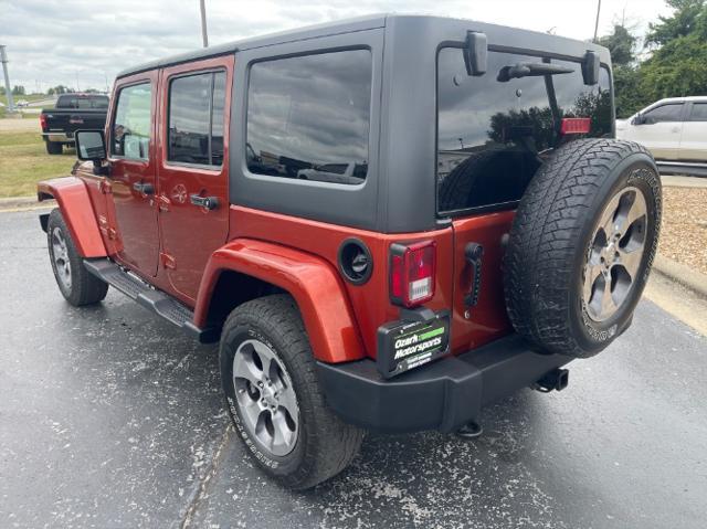 used 2014 Jeep Wrangler Unlimited car, priced at $15,980