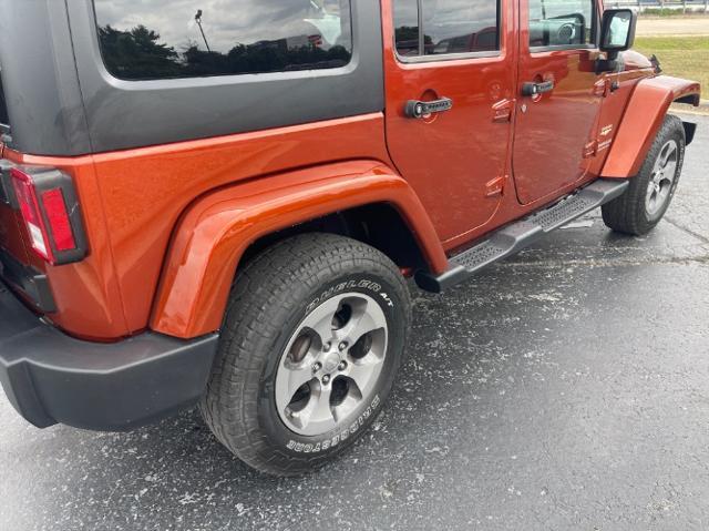 used 2014 Jeep Wrangler Unlimited car, priced at $15,980