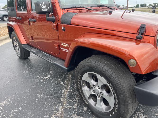used 2014 Jeep Wrangler Unlimited car, priced at $14,980