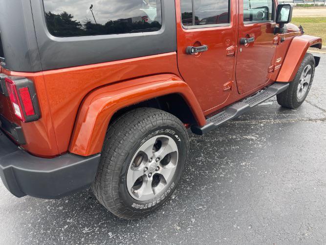 used 2014 Jeep Wrangler Unlimited car, priced at $14,980