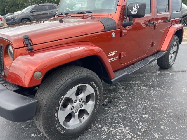 used 2014 Jeep Wrangler Unlimited car, priced at $15,980