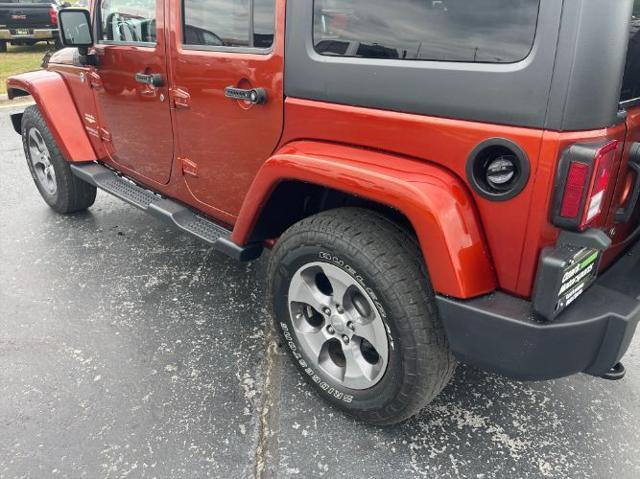 used 2014 Jeep Wrangler Unlimited car, priced at $16,980