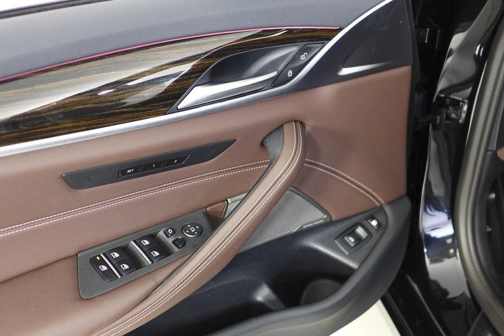 used 2023 BMW 530e car, priced at $30,888