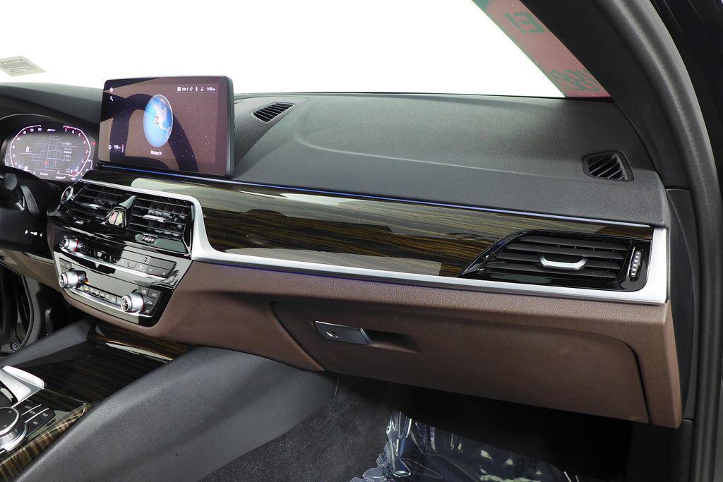 used 2023 BMW 530e car, priced at $30,888