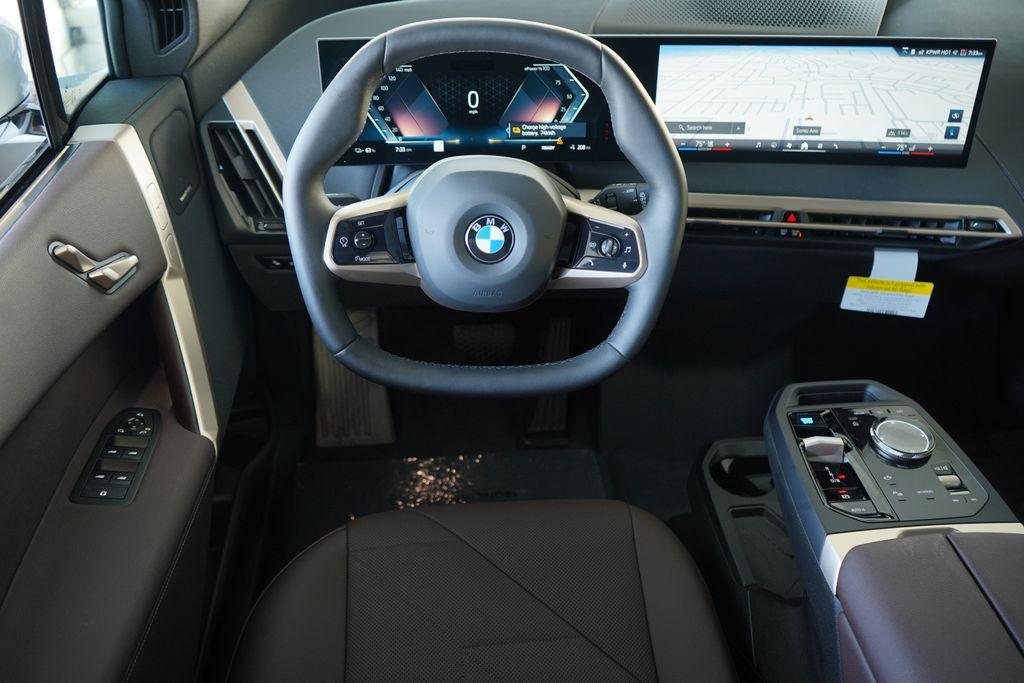 new 2026 BMW iX car, priced at $94,745