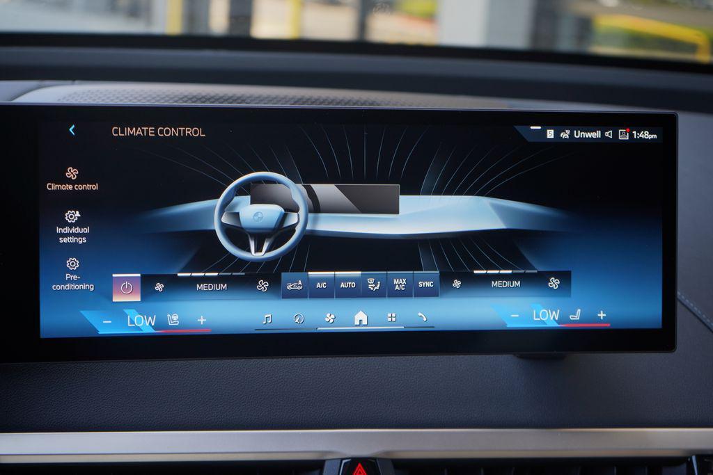 new 2026 BMW iX car, priced at $95,775