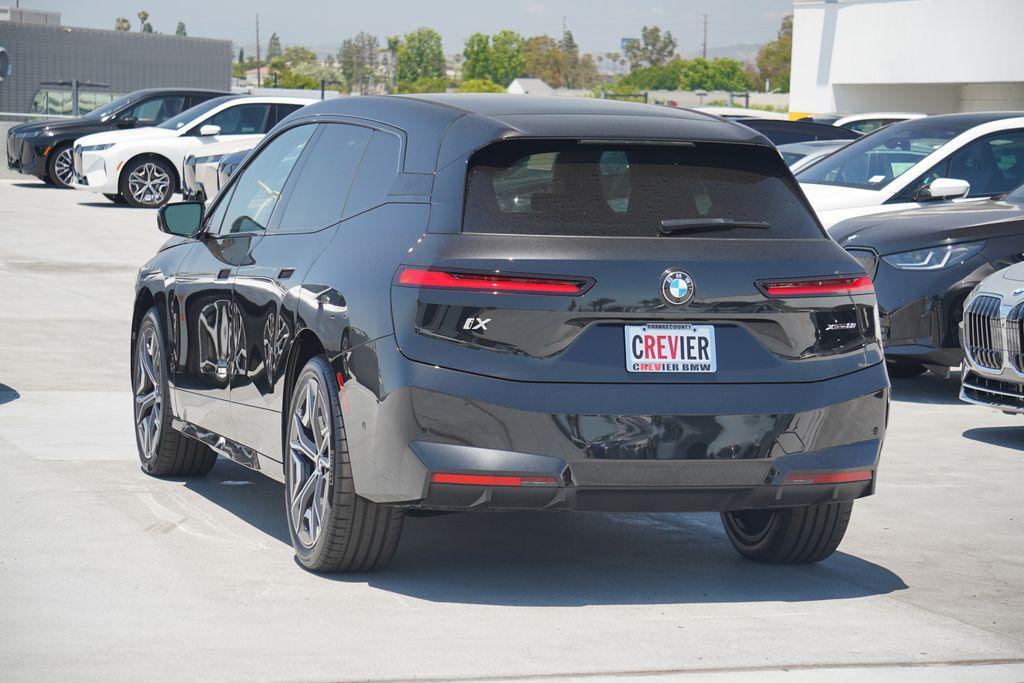 new 2026 BMW iX car, priced at $95,775