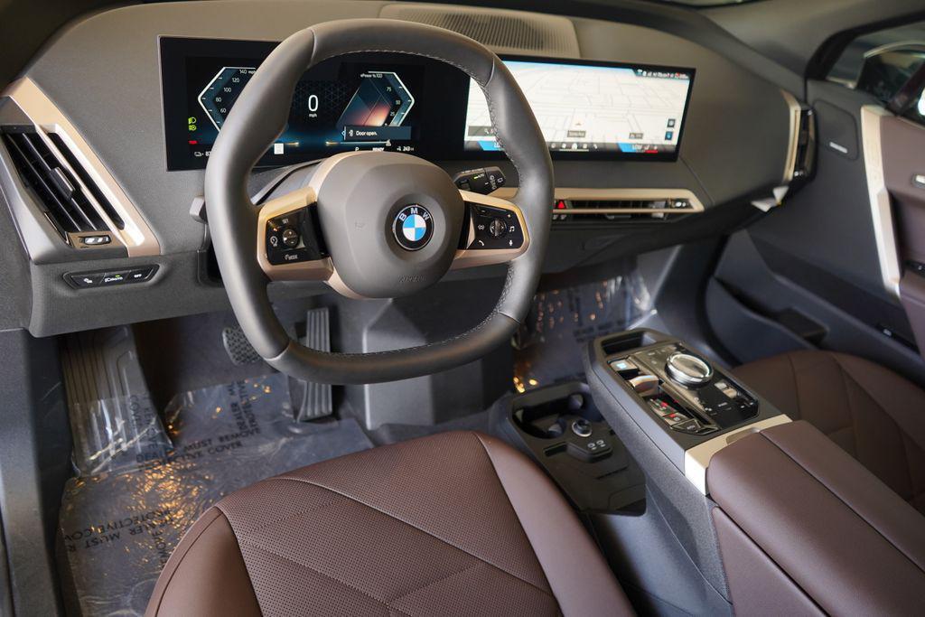 new 2026 BMW iX car, priced at $82,470