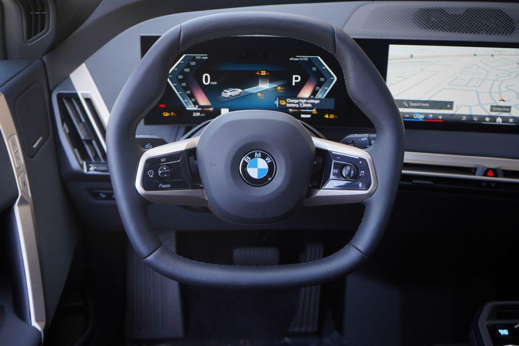 new 2026 BMW iX car, priced at $95,275
