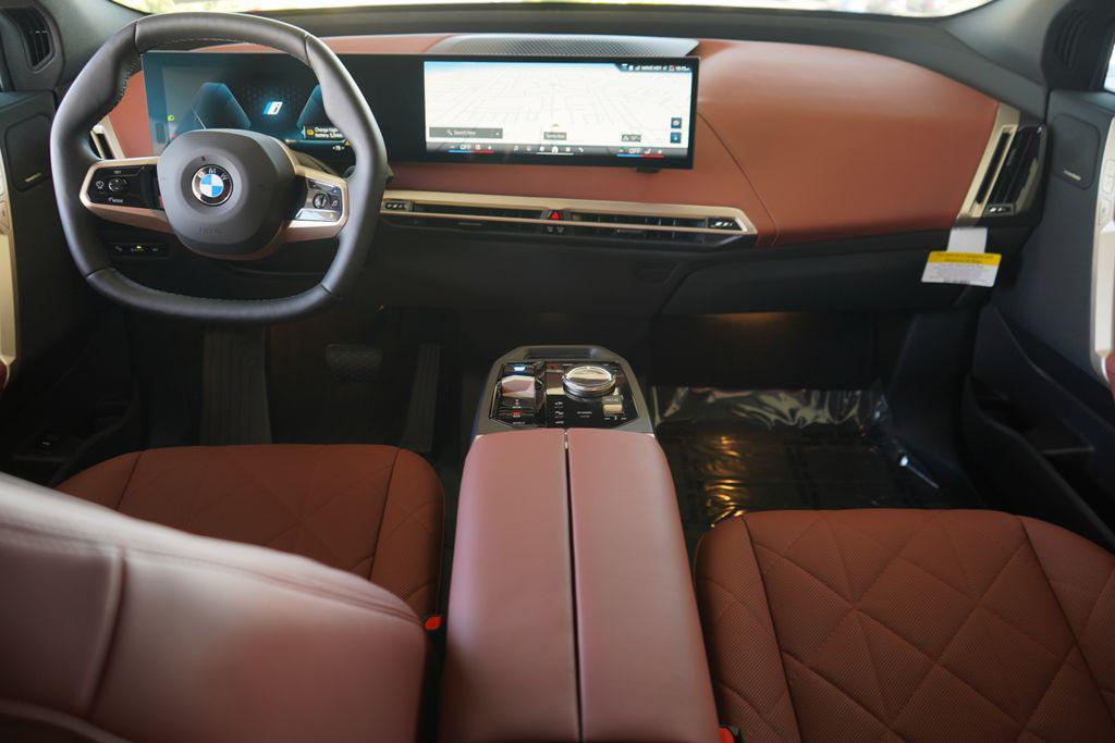 new 2026 BMW iX car, priced at $103,095