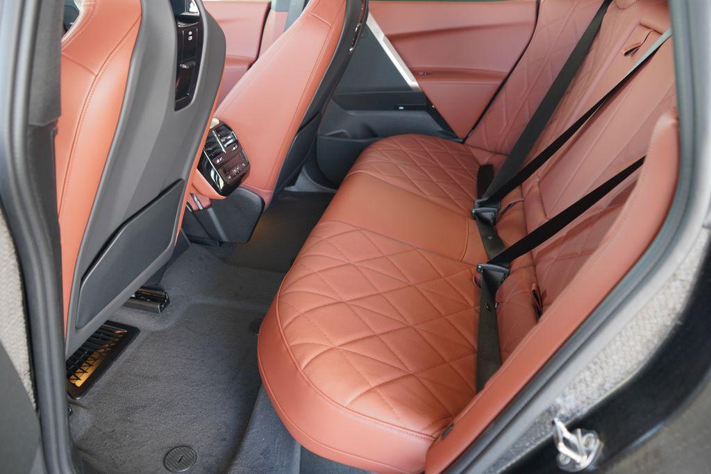 new 2026 BMW iX car, priced at $103,095
