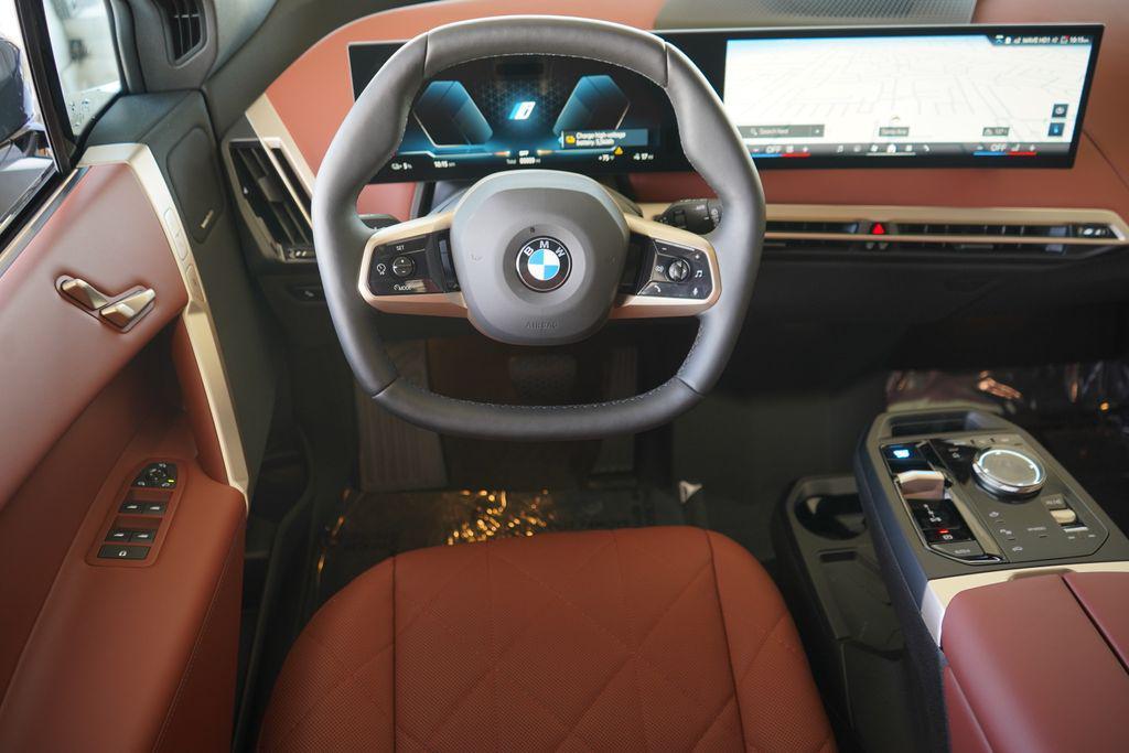 new 2026 BMW iX car, priced at $103,095