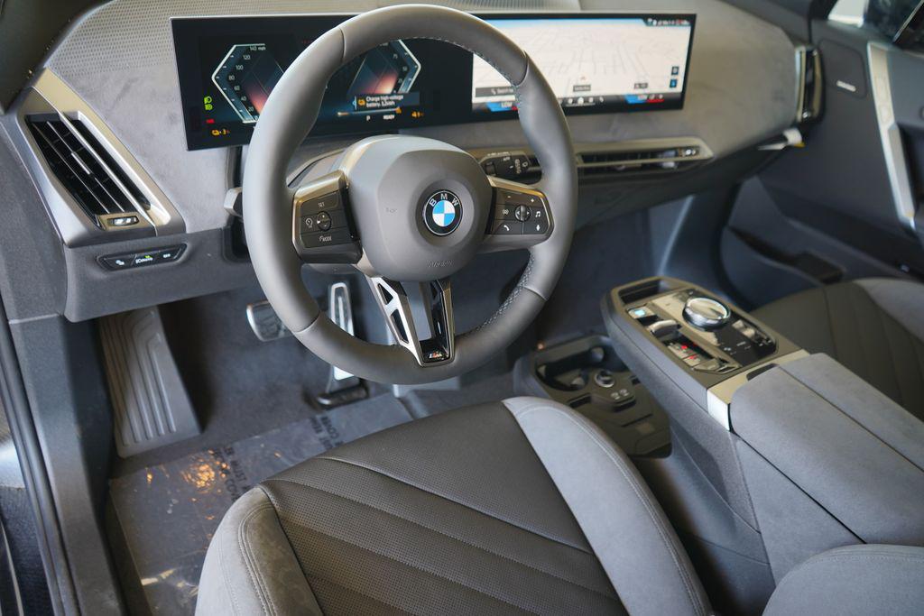 new 2026 BMW iX car, priced at $102,145
