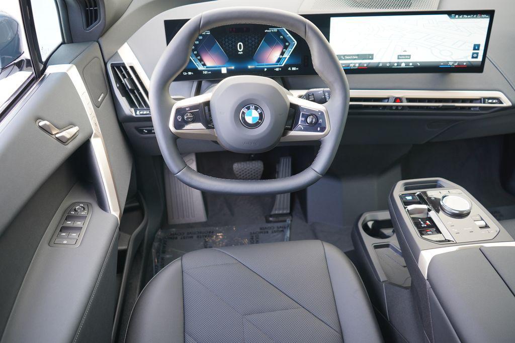 new 2026 BMW iX car, priced at $98,995