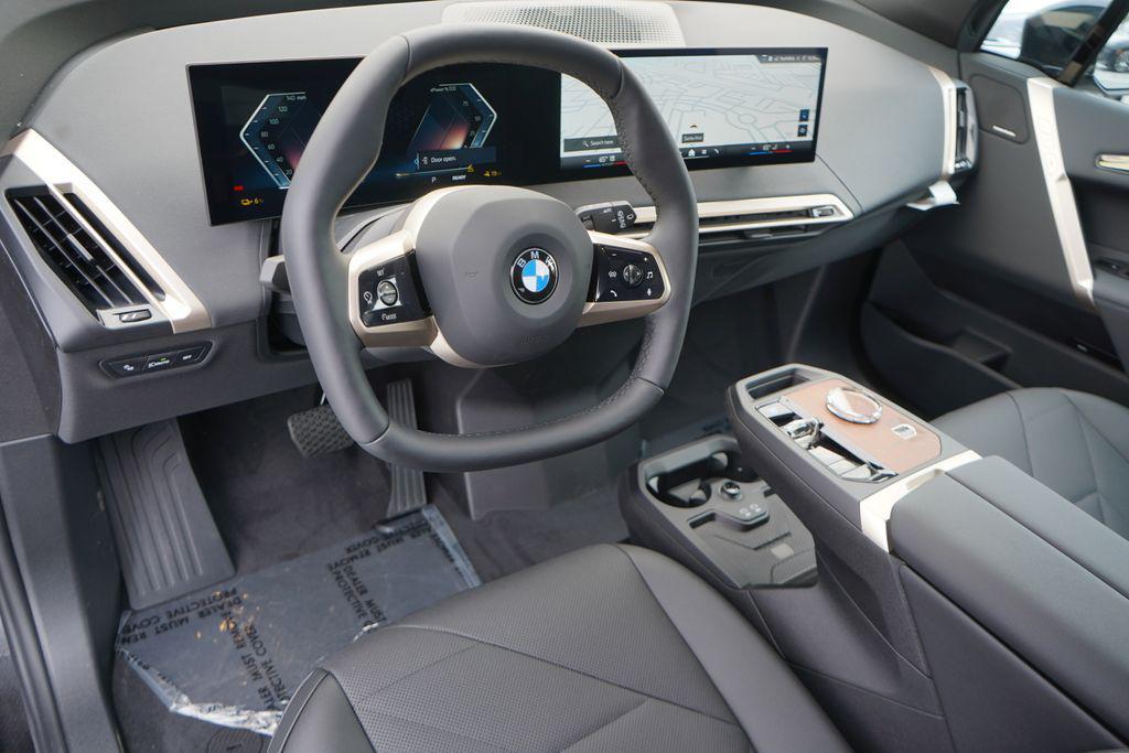new 2026 BMW iX car, priced at $99,875