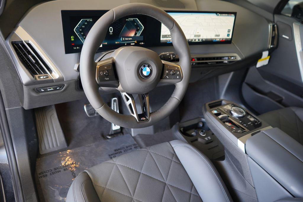 new 2026 BMW iX car, priced at $100,645