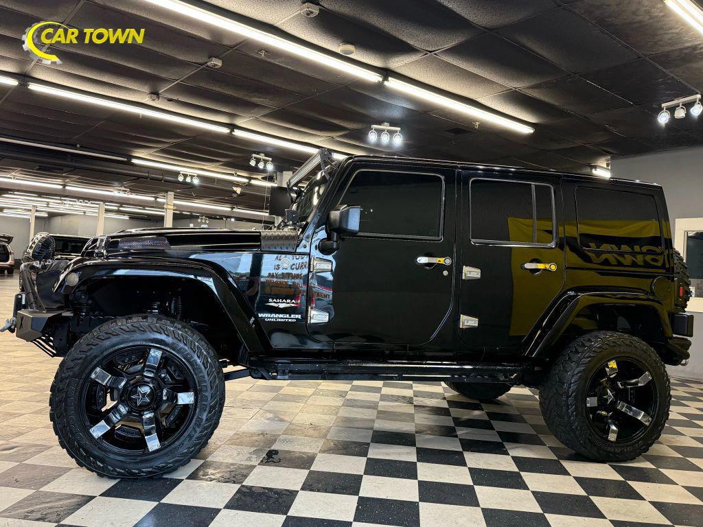 used 2015 Jeep Wrangler Unlimited car, priced at $18,150