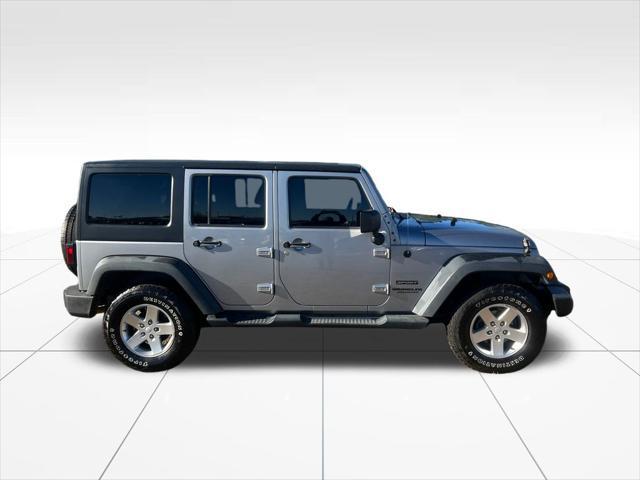 used 2014 Jeep Wrangler Unlimited car, priced at $14,972