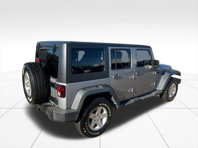 used 2014 Jeep Wrangler Unlimited car, priced at $14,972