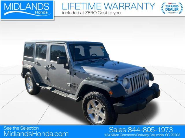 used 2014 Jeep Wrangler Unlimited car, priced at $14,972