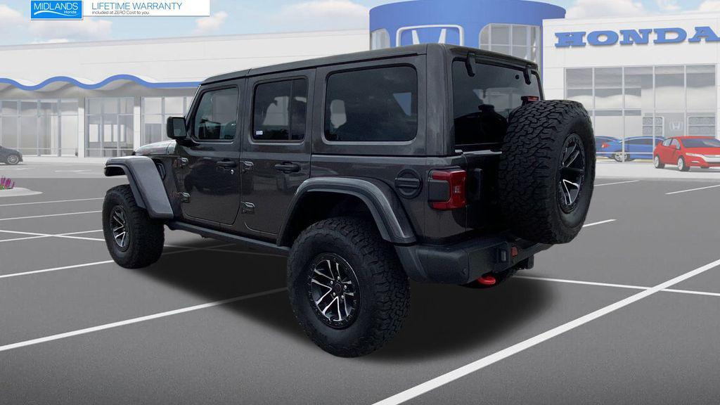 used 2025 Jeep Wrangler car, priced at $59,896