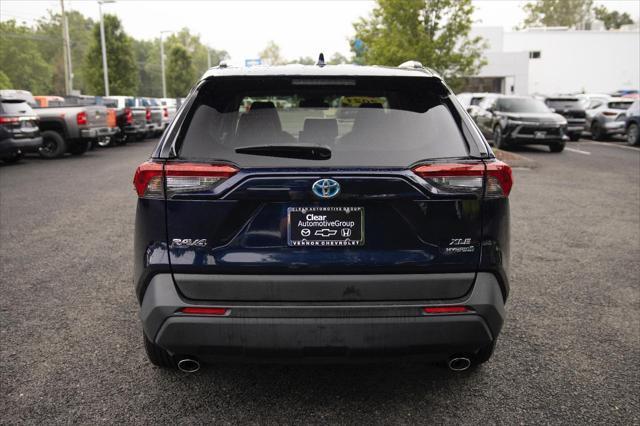 used 2021 Toyota RAV4 Hybrid car, priced at $26,964