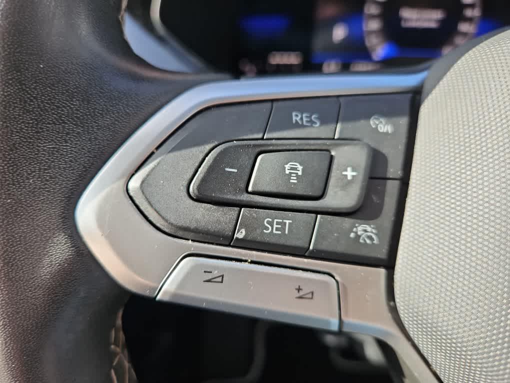 used 2023 Volkswagen Taos car, priced at $23,161