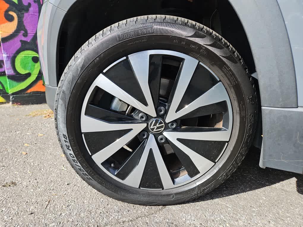 used 2023 Volkswagen Taos car, priced at $23,161
