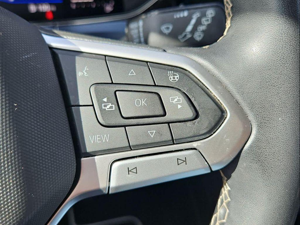used 2023 Volkswagen Taos car, priced at $23,161
