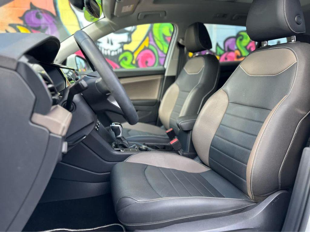 used 2023 Volkswagen Taos car, priced at $23,400