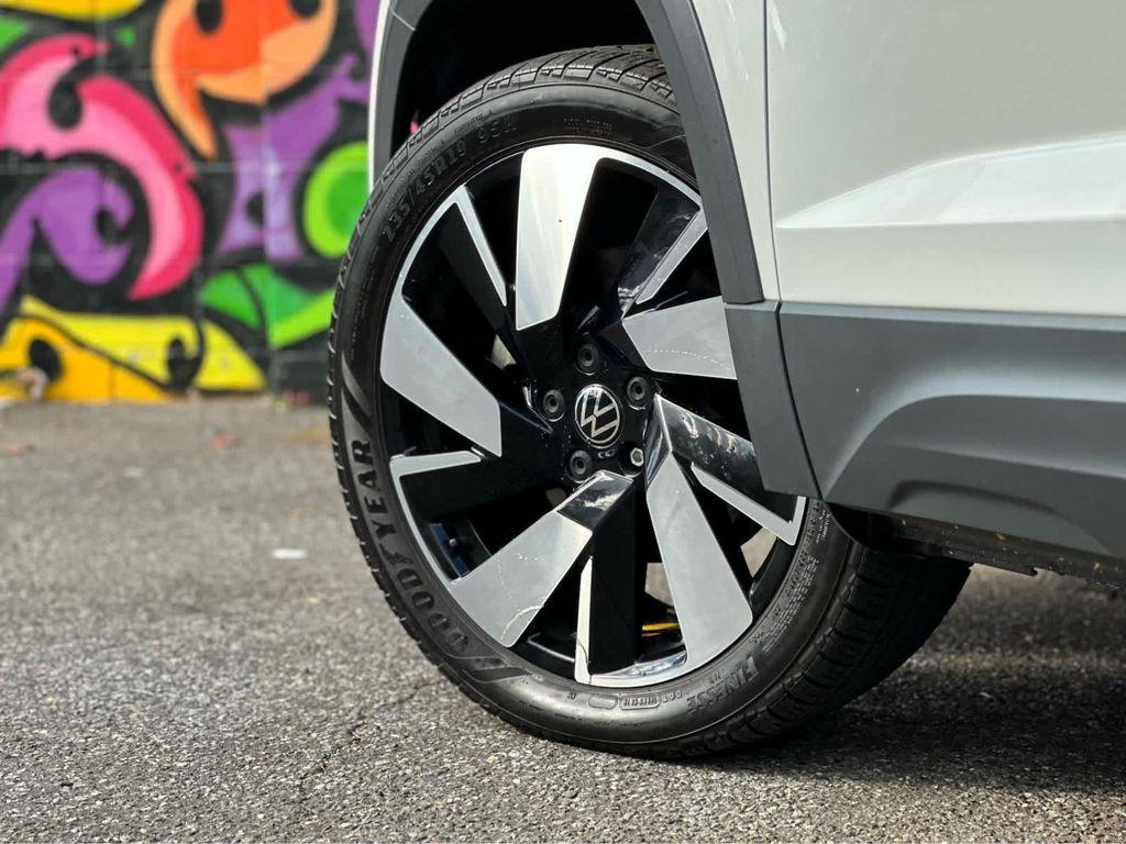 used 2023 Volkswagen Taos car, priced at $23,400