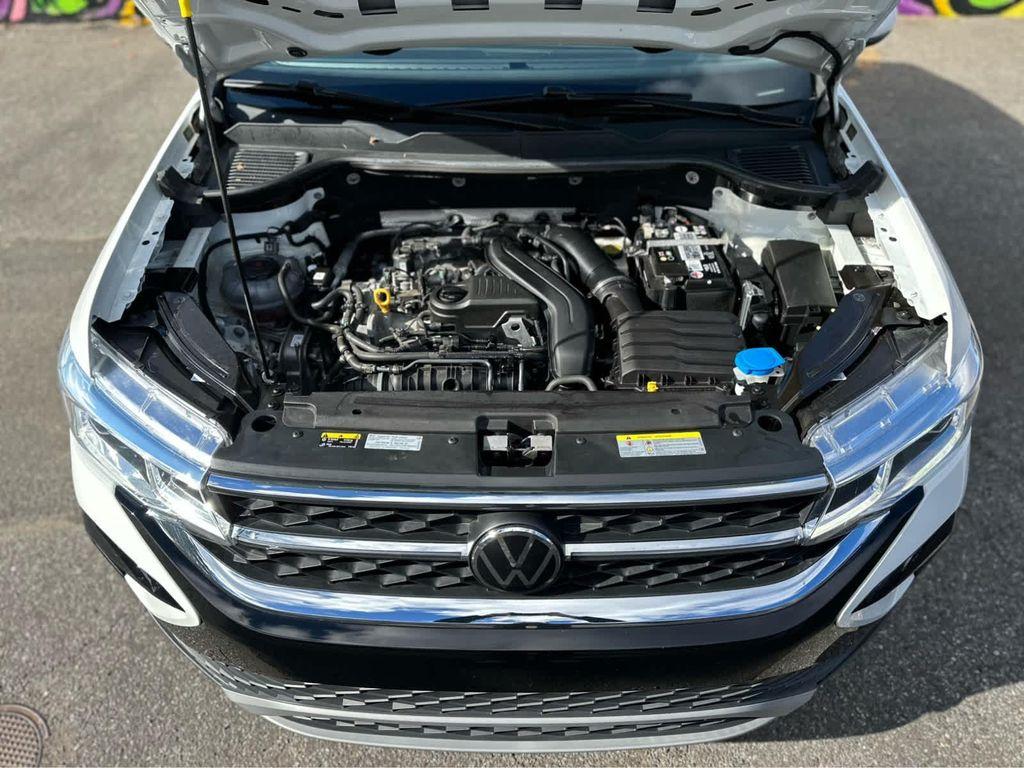 used 2023 Volkswagen Taos car, priced at $23,400