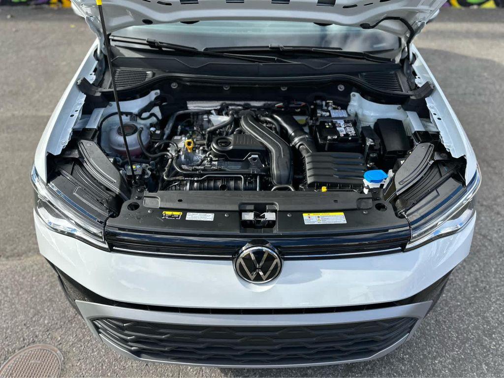 used 2025 Volkswagen Taos car, priced at $27,400