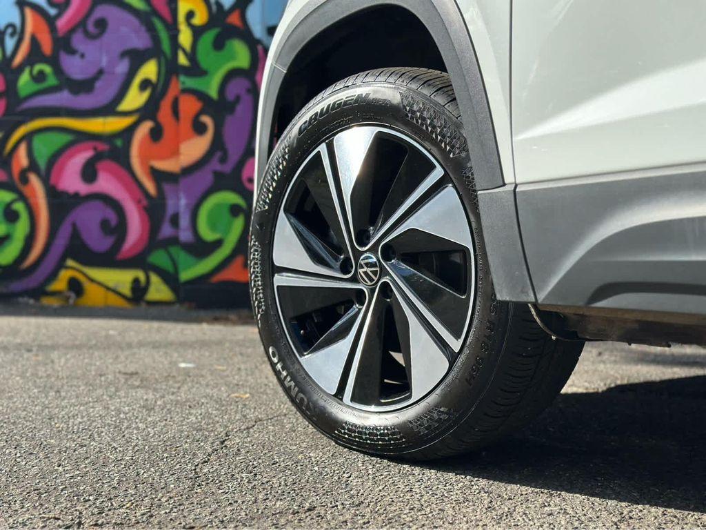 used 2025 Volkswagen Taos car, priced at $27,400