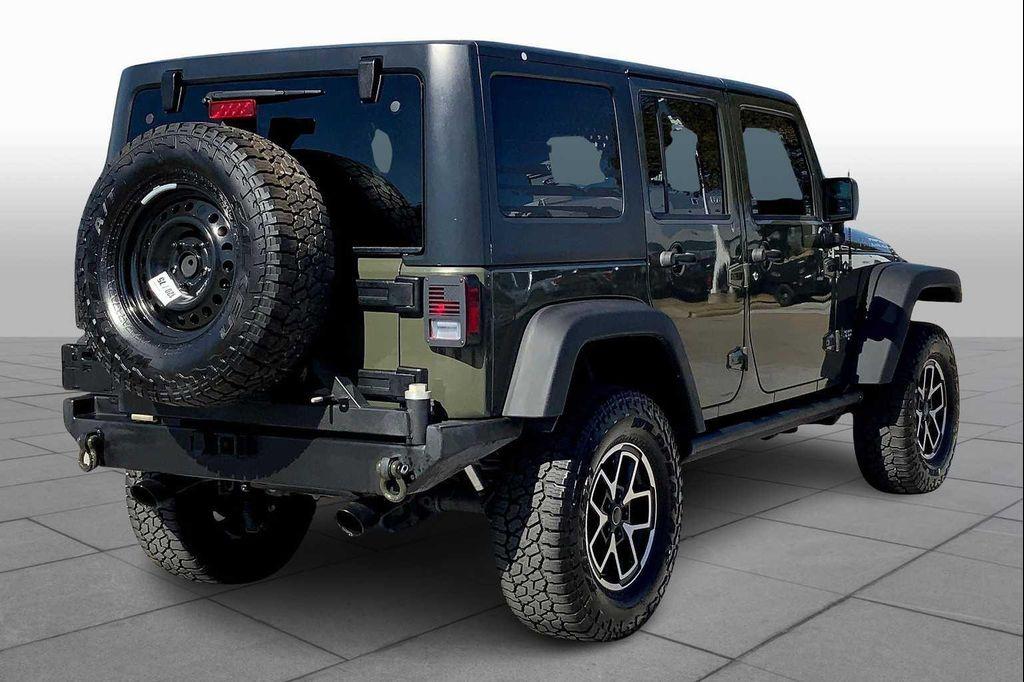 used 2015 Jeep Wrangler Unlimited car, priced at $21,650