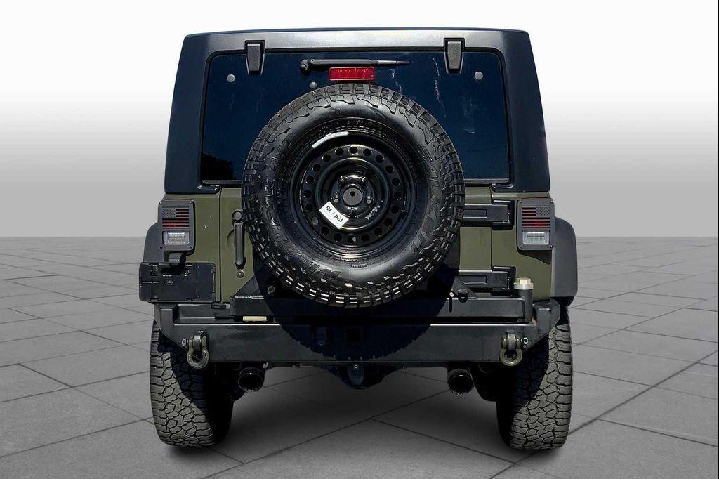 used 2015 Jeep Wrangler Unlimited car, priced at $21,650
